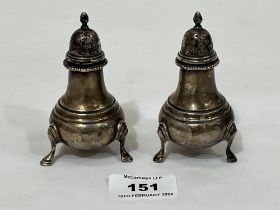 A pair of George VI silver pepperettes. London 1937. 3½" high. 5 ozs 10 dwts