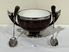 A Victorian carved mahogany and silver mounted fruit bowl, the bowl and silver servers with horn