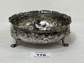 A Victorian silver bowl on three lion mask and paw moulded feet. London 1882. 5¼" diam. 5ozs 3dwts