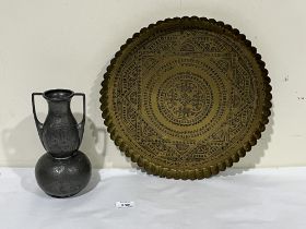 An Art-Nouveau Period pewter planished vase, 9" high and an Islamic brass tray, 15" diam.
