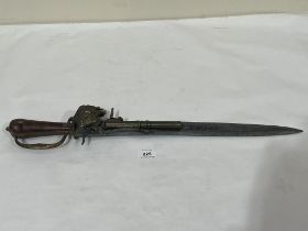 A decorative sword pistol. 25" long