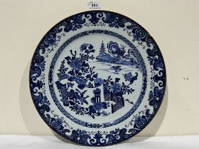 A 19th Century Chinese blue and white decorated charger. 14½" diam. Glued repair.