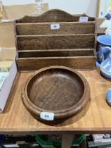 A treen bowl and an oak stationery rack