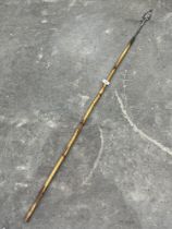 A bamboo hafted fishing spear. 57" long.