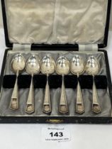 A George V cased set of six silver teaspoons, Sheffield 1920 and a set of six silver coffee