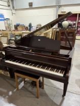 A Carlberg mahogany cased baby grand pianoforte.