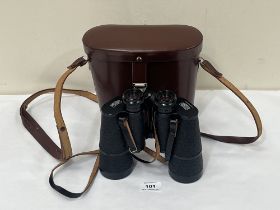 A pair of Carl Zeiss Jenoptem 10x50W binoculars. Leather cased. Optics clear