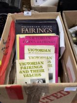 A box of books on antique ceramic fairings.