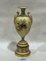 A Royal Worcester blush ivory pedestal vase, gilded and painted with wild flowers. Shape 1969.
