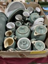 A box of Denby ceramics.