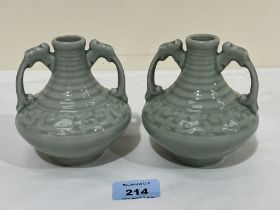 A pair of celadon style glazed two handled vases. 4¼" high.