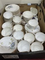 A box of Regency Blue Leaves pattern teaware.