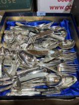 A collection of plated cutlery.