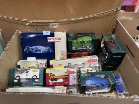 A collection of boxed diecast model vehicles.