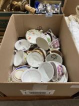 A box of 19th Century cups and saucers.