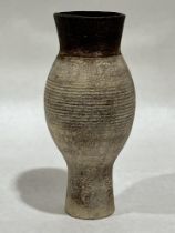 HANS COPER. GERMAN/BRITISH 1920-1981. An ovoid footed vase. Stoneware, layered slips over a textured