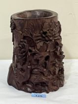 A Chinese hardwood brush pot, Bitong, carved in high relief with trees, a cockeral, chicken and