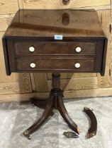 A mahogany Pembroke table on column support and splayed legs. 20" wide. Broken leg and foot.