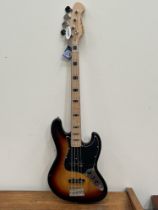 A Harley Benton Vintage Series bass guitar with soft case.