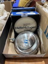 Two Hella 144 halogen motorcar spotlamps with original boxes.