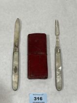 A Georgian silver and mother-of-pearl folding knife and fork in Morocco travelling case. The knife