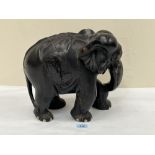 A carved ebony elephant. 12" high.