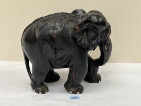 A carved ebony elephant. 12" high.