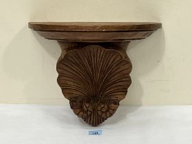 A shell carved wood wall bracket, 14¾"w x 11¾"h.