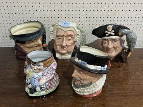 Four large Royal Doulton character jugs and a 19th Century Staffordshire Toby jug.