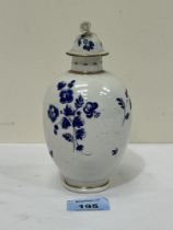 A Worcester type inverted baluster jar and cover in powder blue. 6¼" high. Chip to cover.