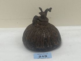 A 19th Century eastern cast iron inkwell. 3½" diam.