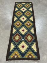 A Maimana Kilim runner. 2.05m x 0.62m.