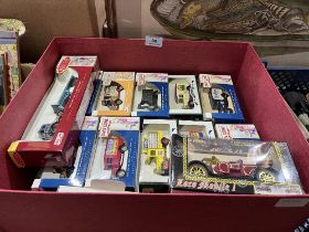 A collection of boxed diecast model vehicles.