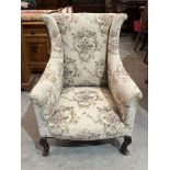 A 1920s wing armchair.
