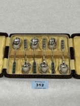 A cased George V set of six silver and enamel teaspoons by Liberty & Co. Birmingham 1928. 2oz