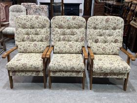 A set of three modern upholstered armchairs by Joynson Holland.