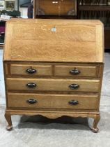 An early 20th Century oak bureau. 34" wide.