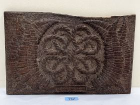 An oak panel carved with a rope pattern and ferns. 14½" wide.