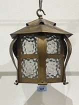 An Arts and Crafts painted brass hall lantern. 9" high.