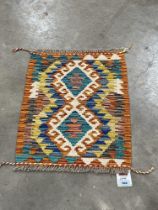 A Chobi Kilim small rug. 0.57m x 0.45m.