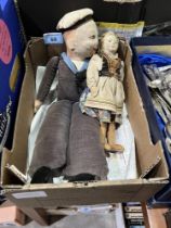 A Norah Wellings sailor doll and an East European doll.