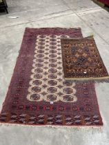 Two Eastern rugs, the larger 81" x 50".