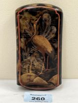 A Japanese sleeved case, gilded with birds and foliage. 5" high. Split to inner case.