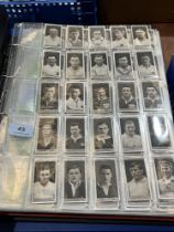 Two albums of cigarette cards, sets and part sets with a collection of type cards.