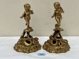 A pair of gilt bronze putto and serpent incense burners. 9½" high.