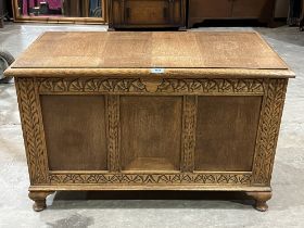 An oak panelled chest. 36" wide.