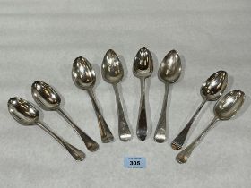 Eight Georgian silver table spoons. Various dates. 14ozs.