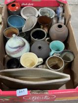 Two boxes of studio pottery.