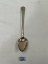 A George III silver basting spoon. London 1805. 12" long. 3ozs 16dwts.