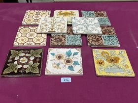 Eleven Victorian ceramic tiles.